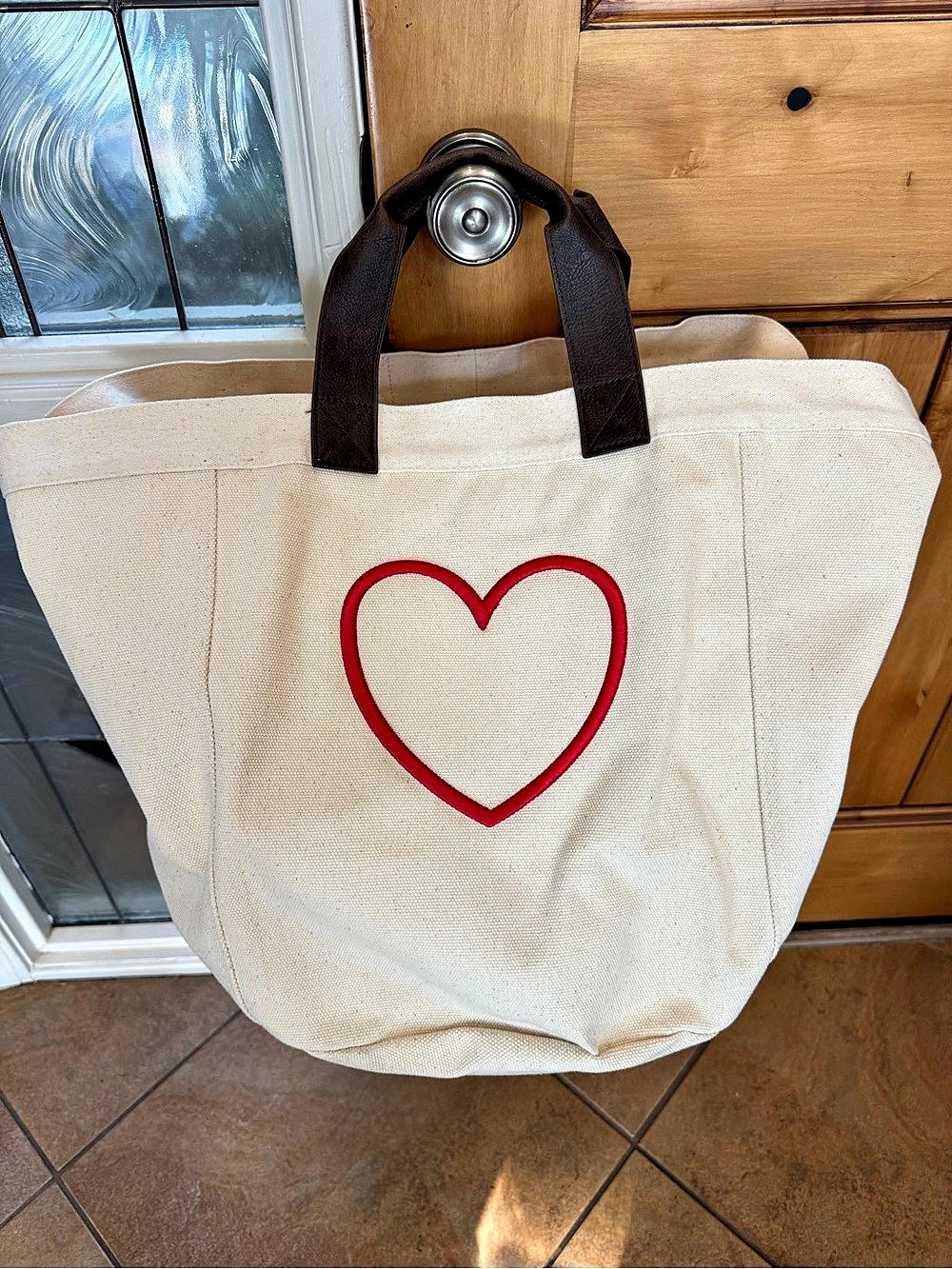 Thirty-One Canvas in natural with red embroidered heart. Display only!